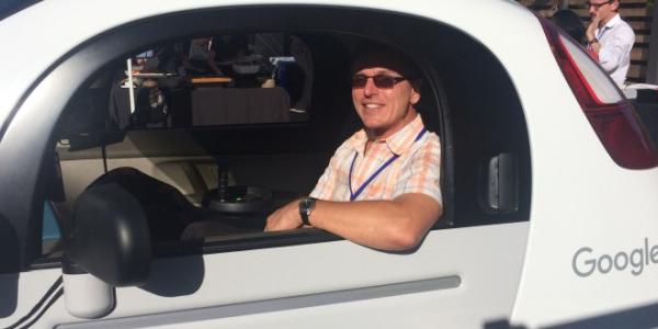A man driving a Google car