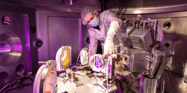 Chandra Breanne Curry works with a high-power laser in her lab at the SLAC National Accelerator Laboratory in California.
