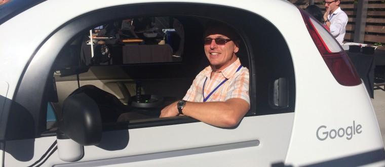 A man driving a Google car