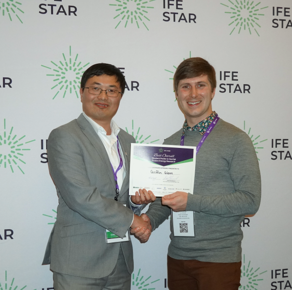 Griffin Glenn receiving best poster award